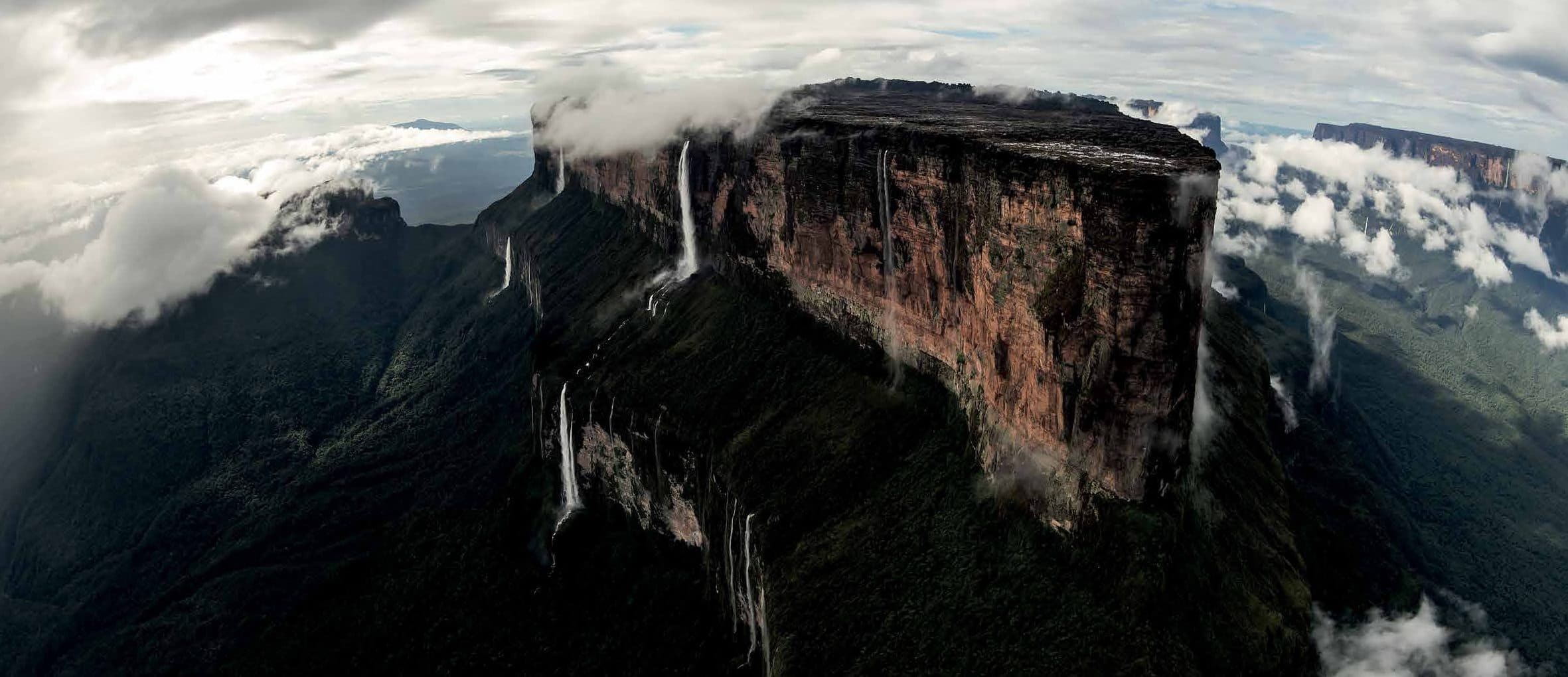 A tepui summit wrapped in cloud, seen from the air
