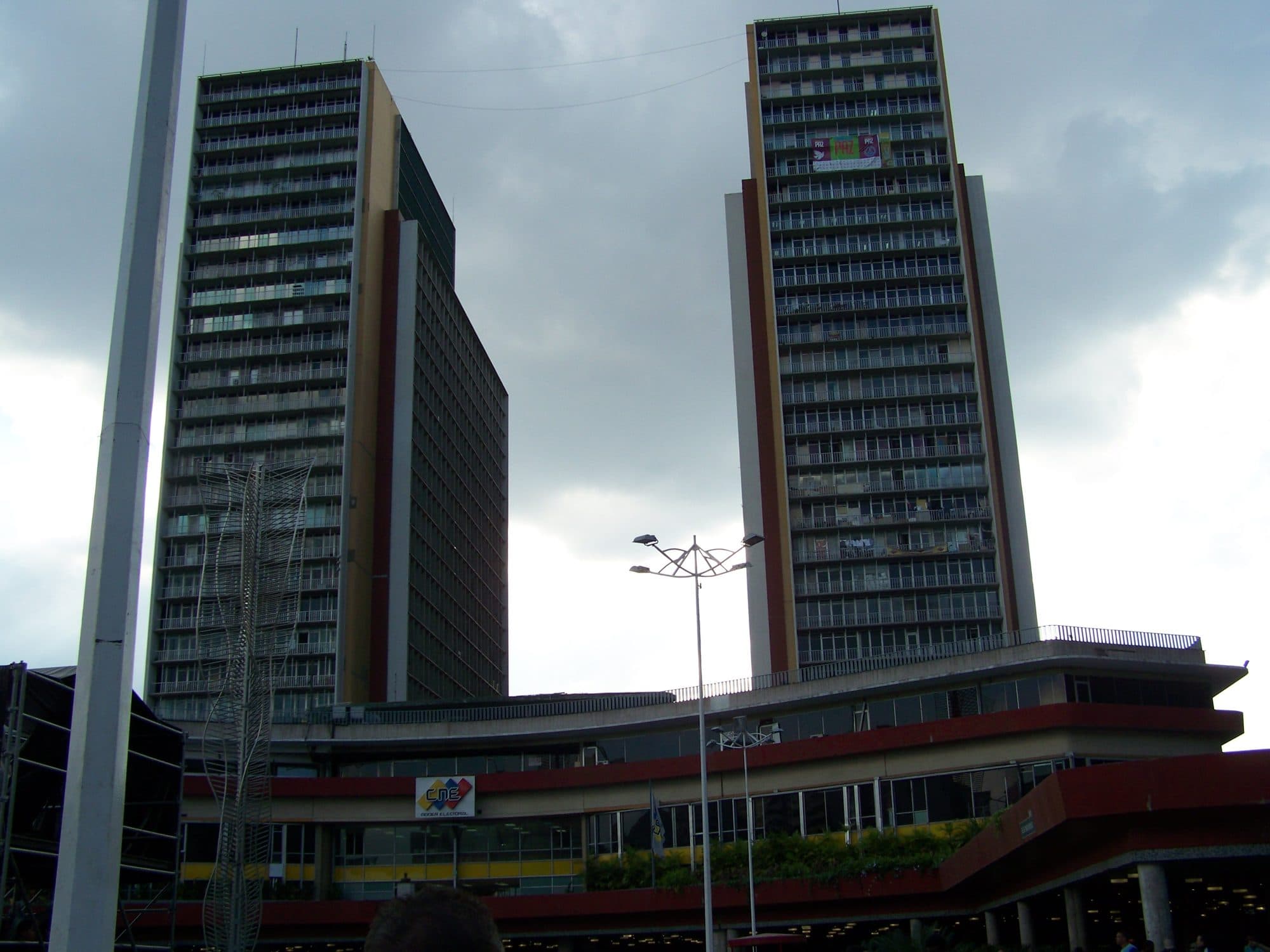 The two office towers of the Centro Simón Bolívar rising above the curved lower podium in Caracas